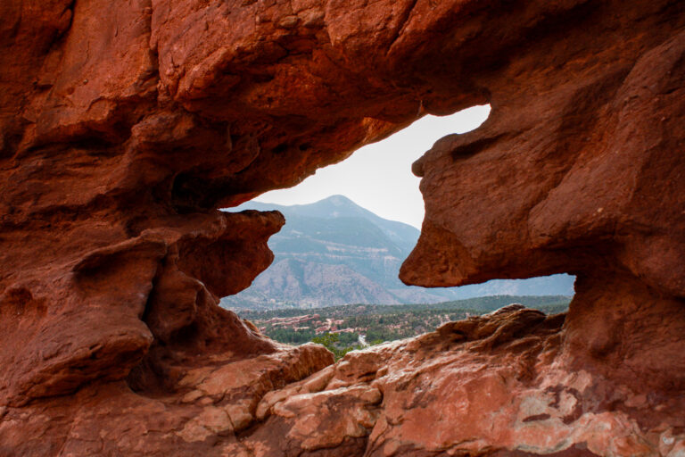 A view through the rocks at Garden of the Gods state park, Colorado, US - Photography by Som Prasad