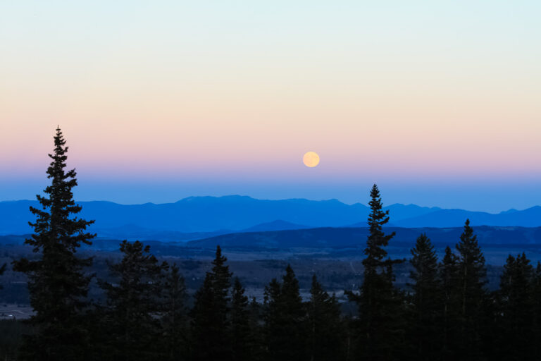 An October Moon over the Colorado Rockies, US -Photography by Som Prasad
